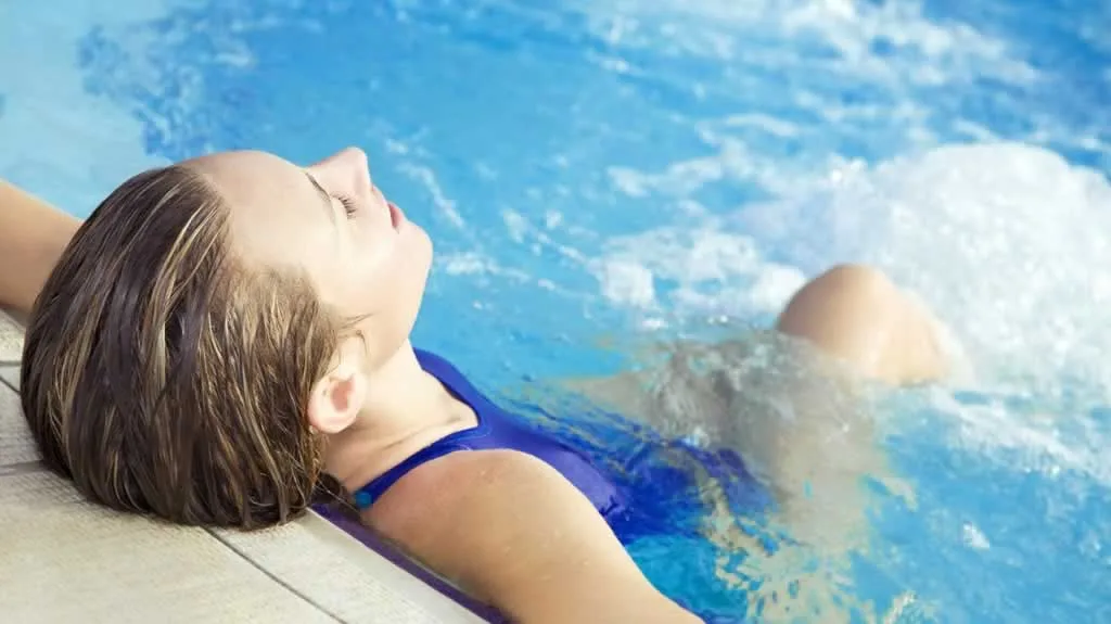 woman relaxing in the pool